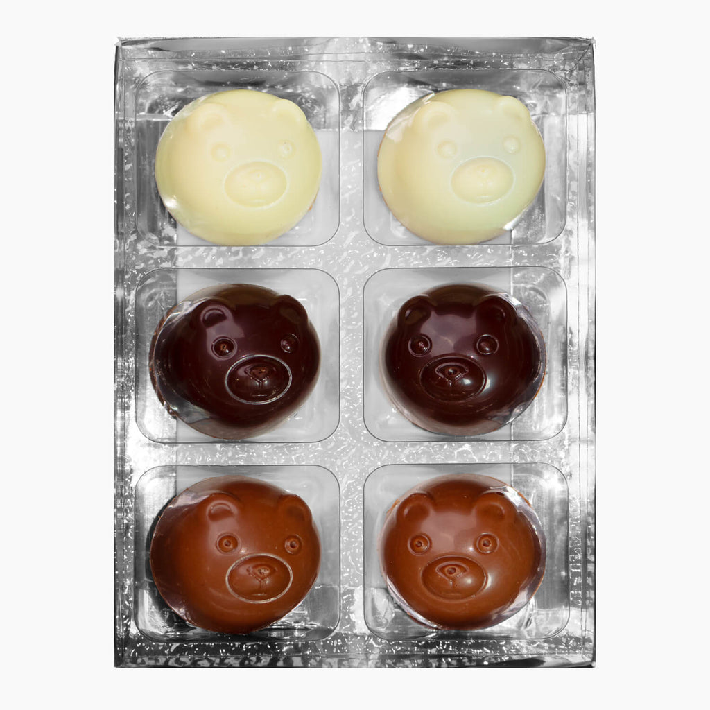 Six chocolate polar bares, showing white, milk and dark 