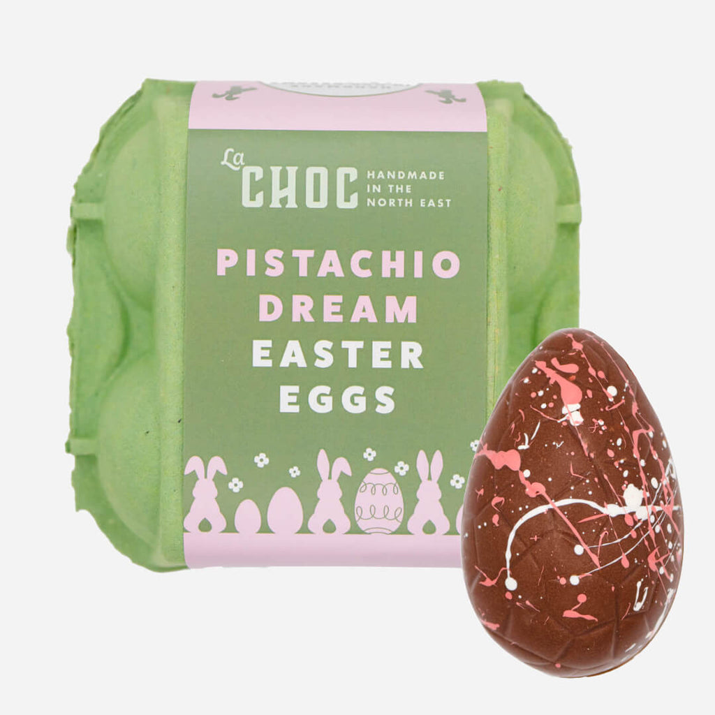 A green carton of La Chocolatrice's Pistachio Dream Easter Eggs, handmade in the North East with a chocolate egg.